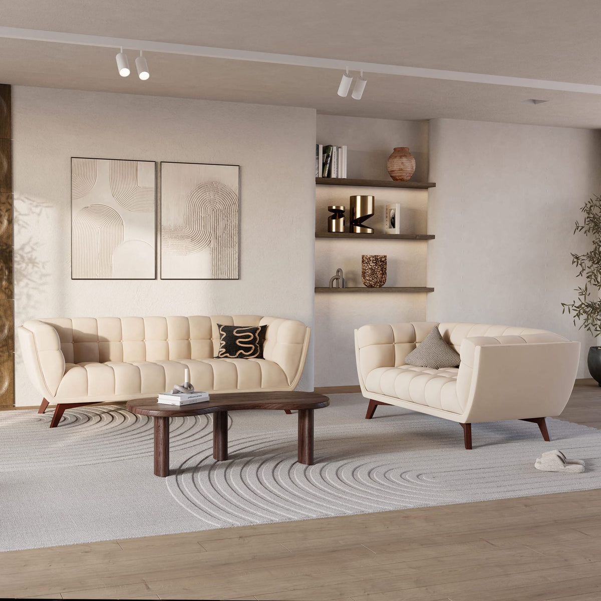 Canapé et fauteuil capitonnés en cuir crème, pieds bois noyer, salon moderne épuré ambiance lumineuse – Maison Pavane