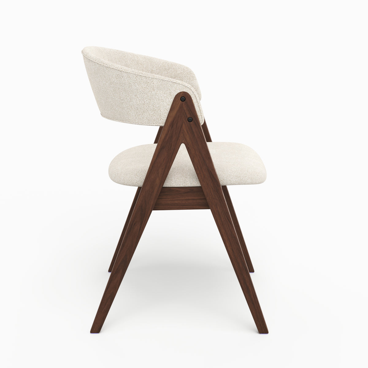Chaise Isis en bois foncé et tissu beige, vue de profil - Maison Pavane