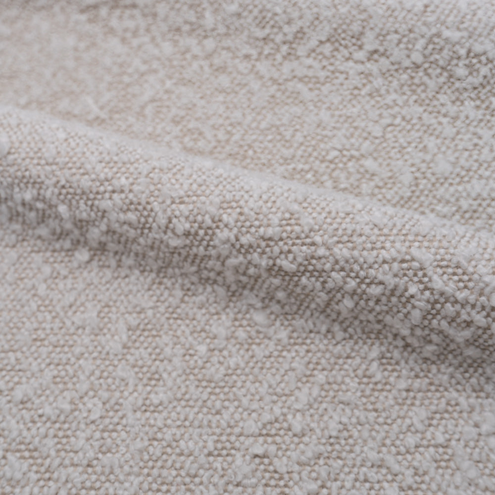 fauetuil en tissu boucle blanc et doux confortable